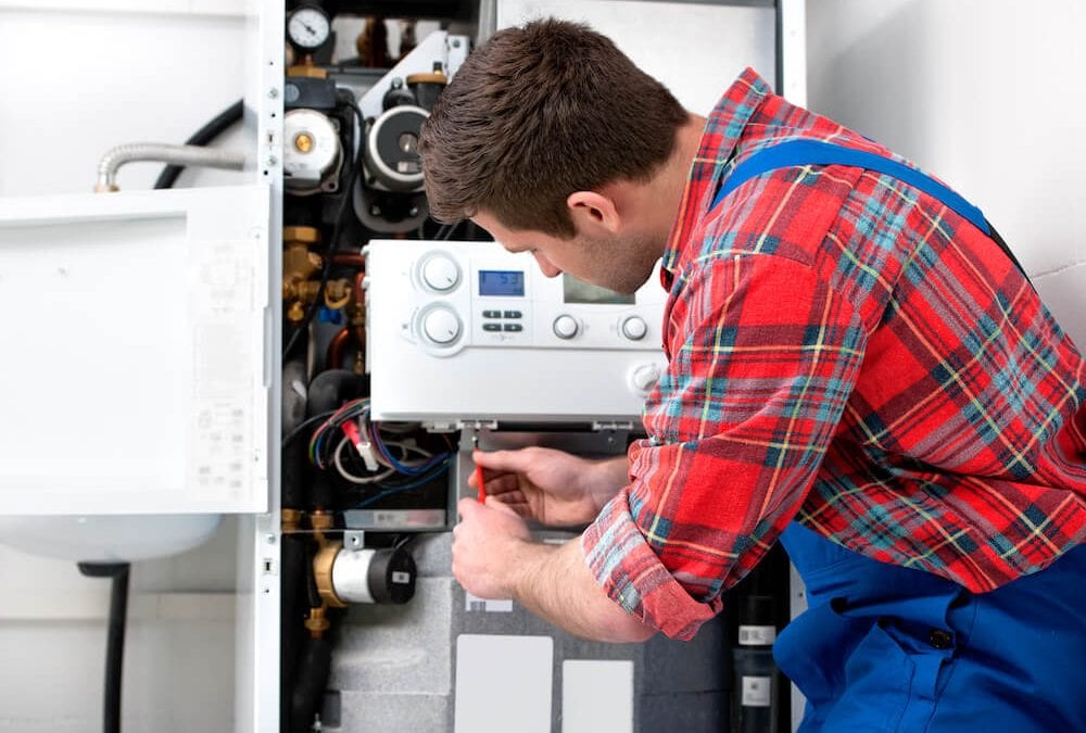 Technician Repairing Heater System